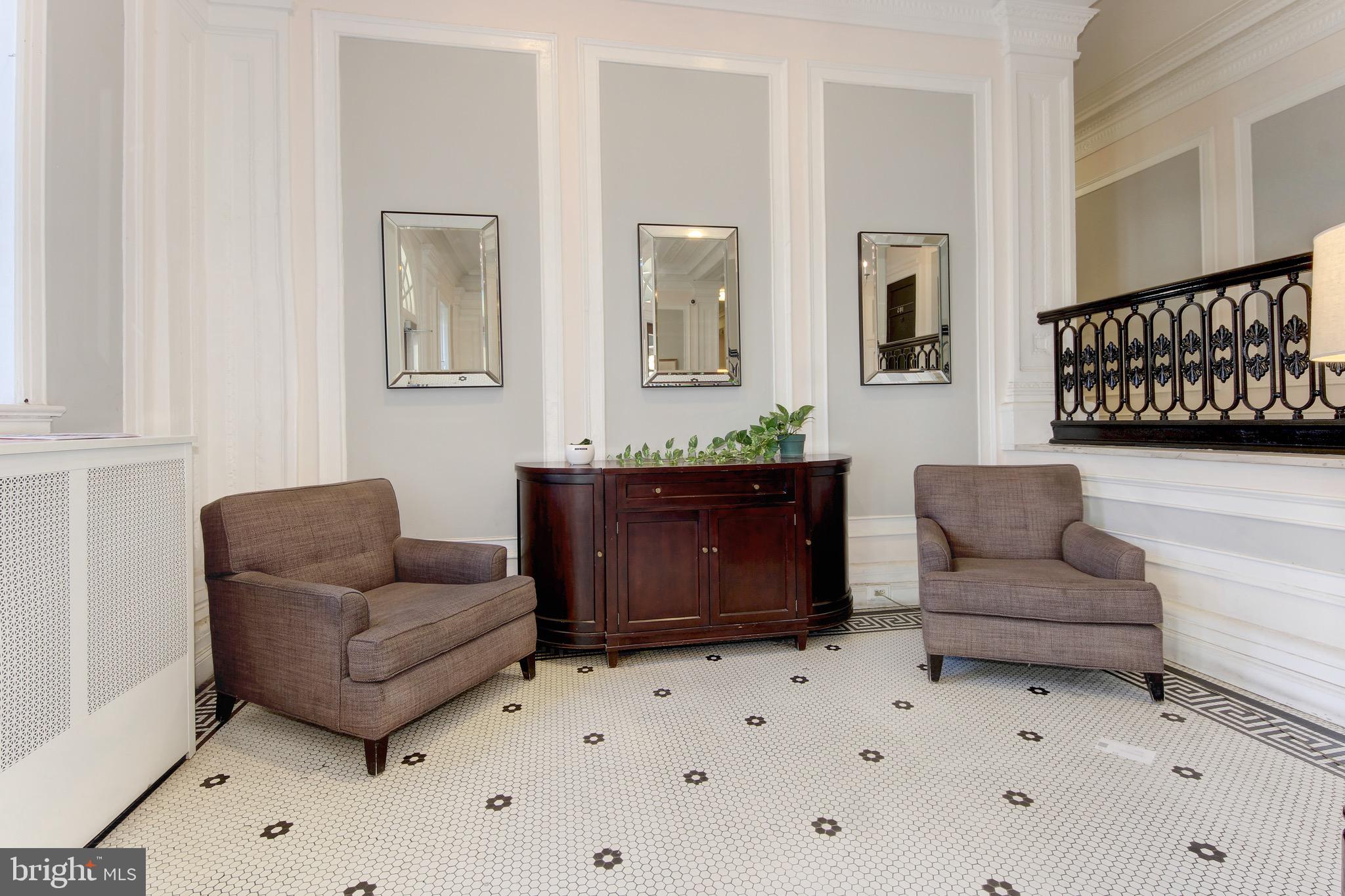 1526 17th Street Northwest, Unit 207 Washington, DC 20036 - Photo 19 of 49 a living room with furniture and a couch