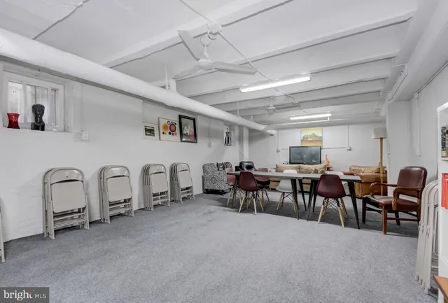 a living room with lots of furniture