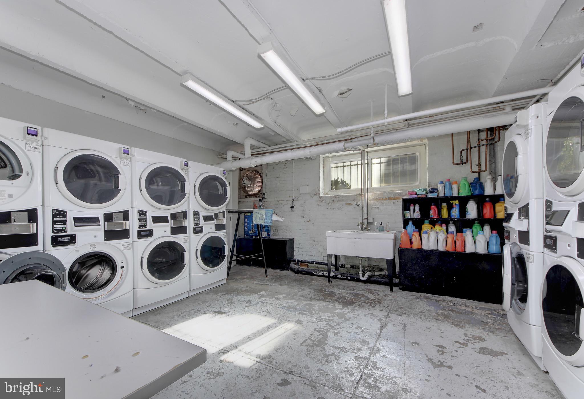 1526 17th Street Northwest, Unit 207 Washington, DC 20036 - Photo 22 of 49 a view of a storage & utility room with washer and dryer