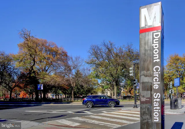 a view of a building with sitting area