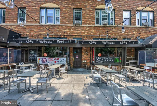 a view of a cafe with furniture