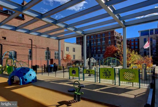 a view of a brick building with many windows