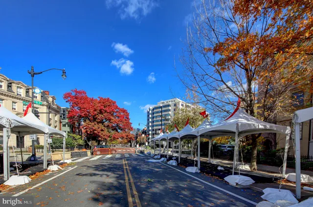 a view of a building with sitting area
