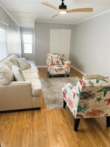 a living room with furniture and a couch