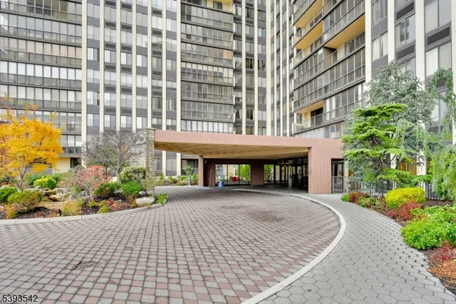 a view of a hallway with seating area