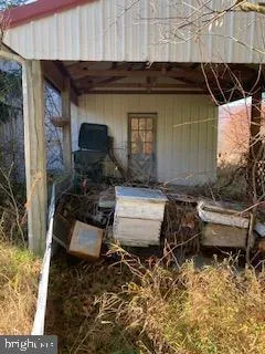 a living room filled with furniture and a fireplace