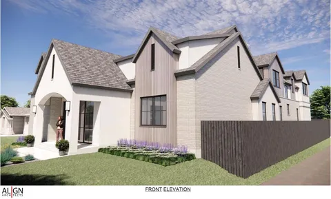 a view of house with backyard