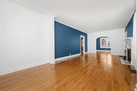 a view of a livingroom with wooden floor