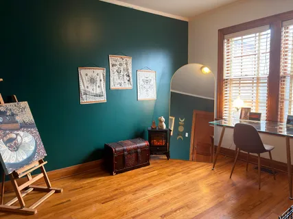 a room with furniture and a window