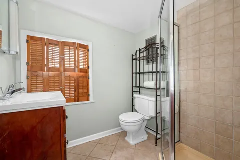 a bathroom with a toilet and a sink