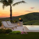 a view of a swimming pool with a garden