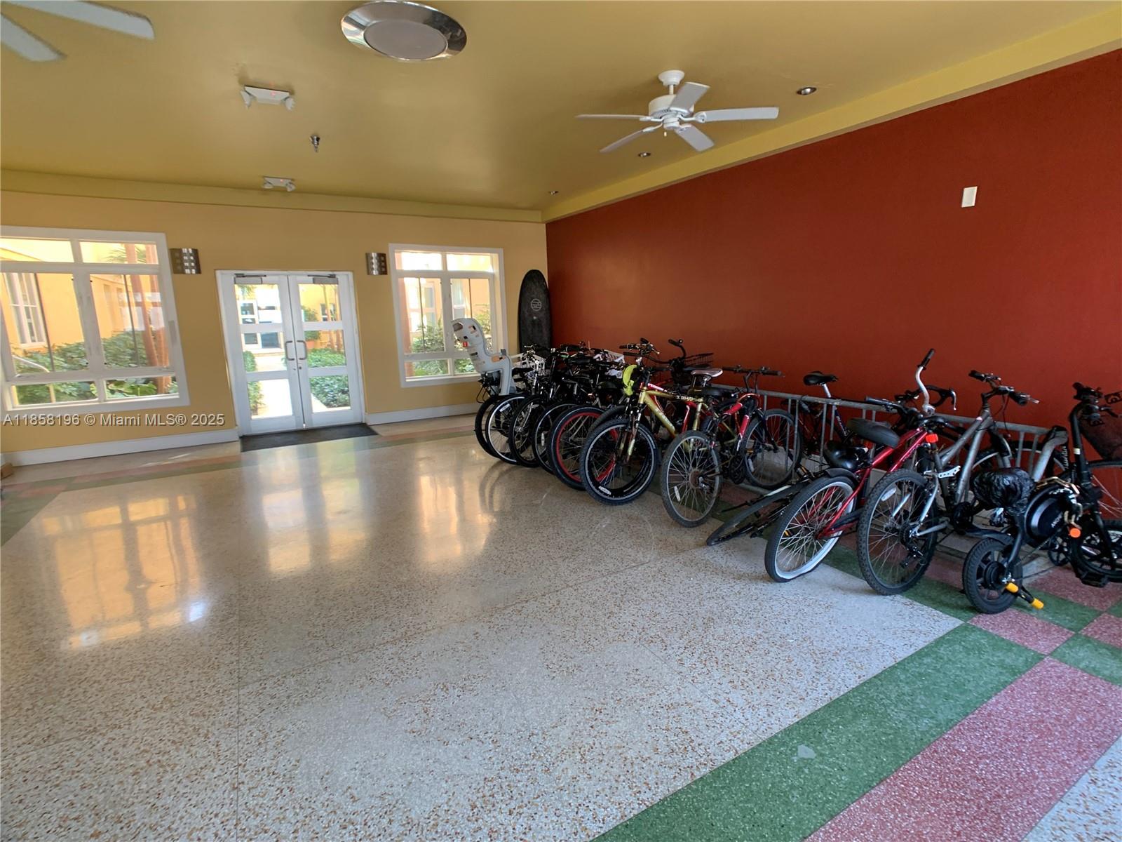 1308 Drexel Avenue, Unit 105 Miami Beach, FL 33139 - Photo 3 of 24 a view of a room with gym equipment