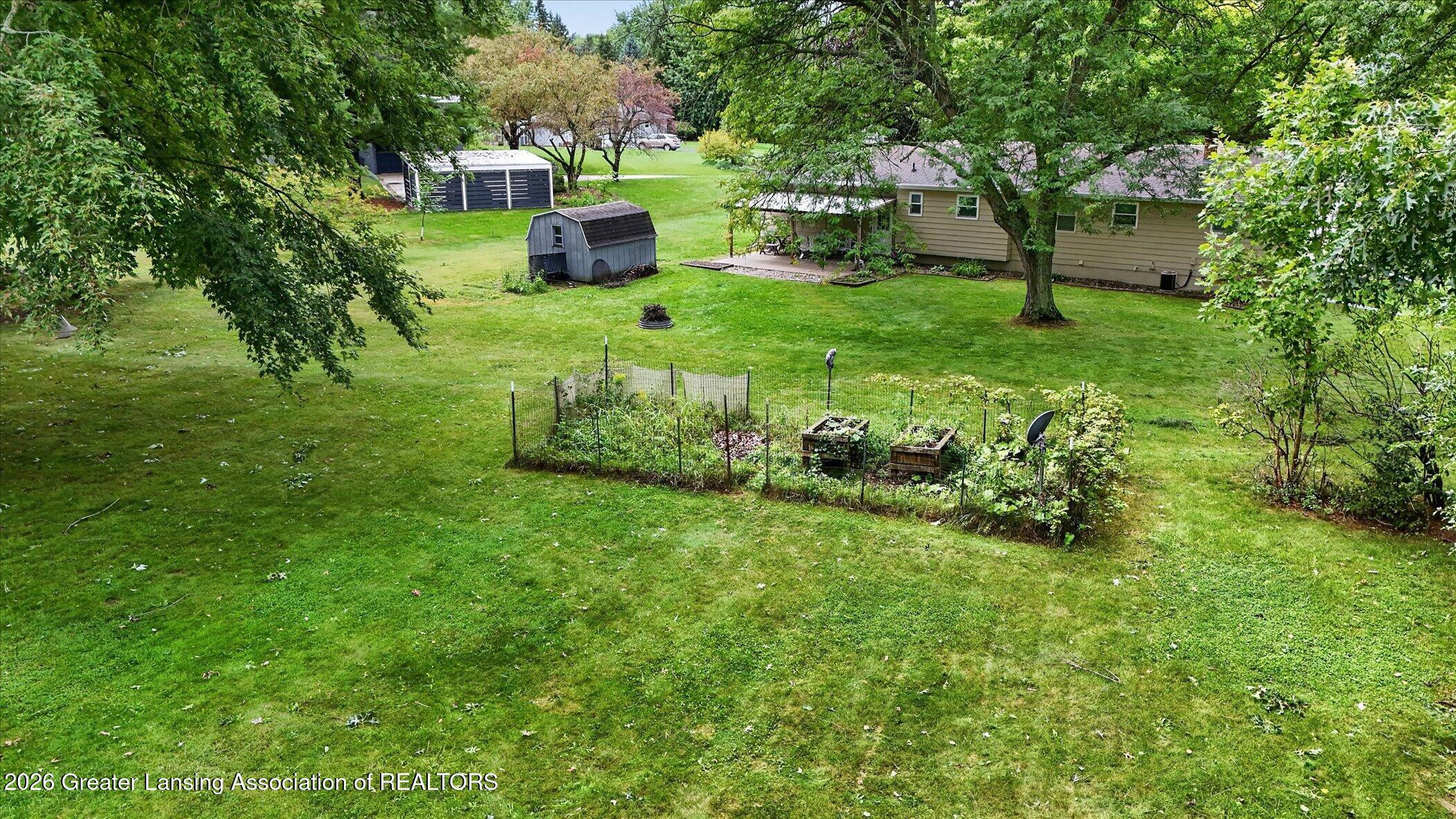 12916 Rambler Road Dewitt, MI 48820 - Photo 53 of 59 53-12916-Rambler-Rd-WindowStill-Photogra