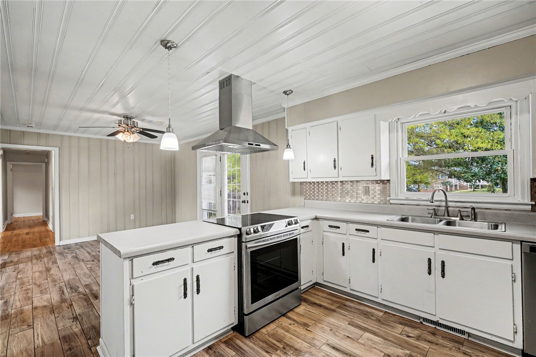 798 Coneross Creek Road Seneca, SC 29678 - Photo 13 of 34 This bright kitchen combines functionality with a fresh aesthetic, ideal for everyday living.