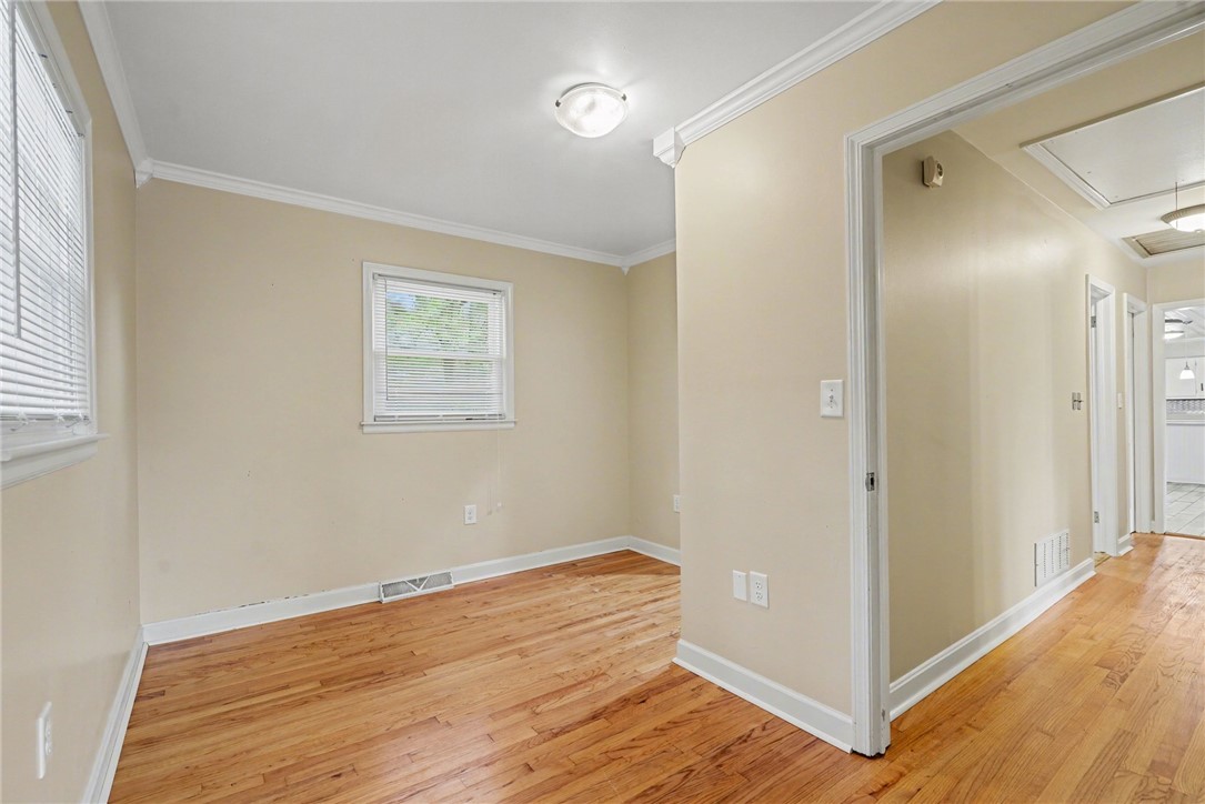 798 Coneross Creek Road Seneca, SC 29678 - Photo 15 of 34 This versatile room features warm hardwood floors and abundant natural light.