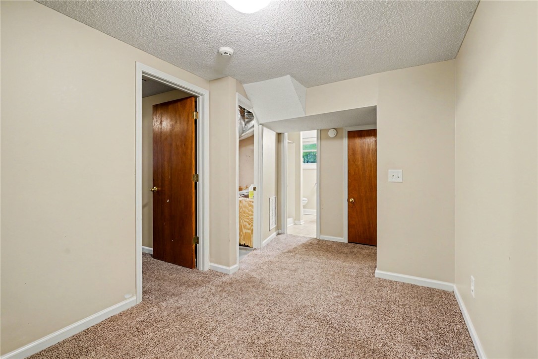 798 Coneross Creek Road Seneca, SC 29678 - Photo 23 of 34 This versatile basement space offers ample potential for customization and future development.