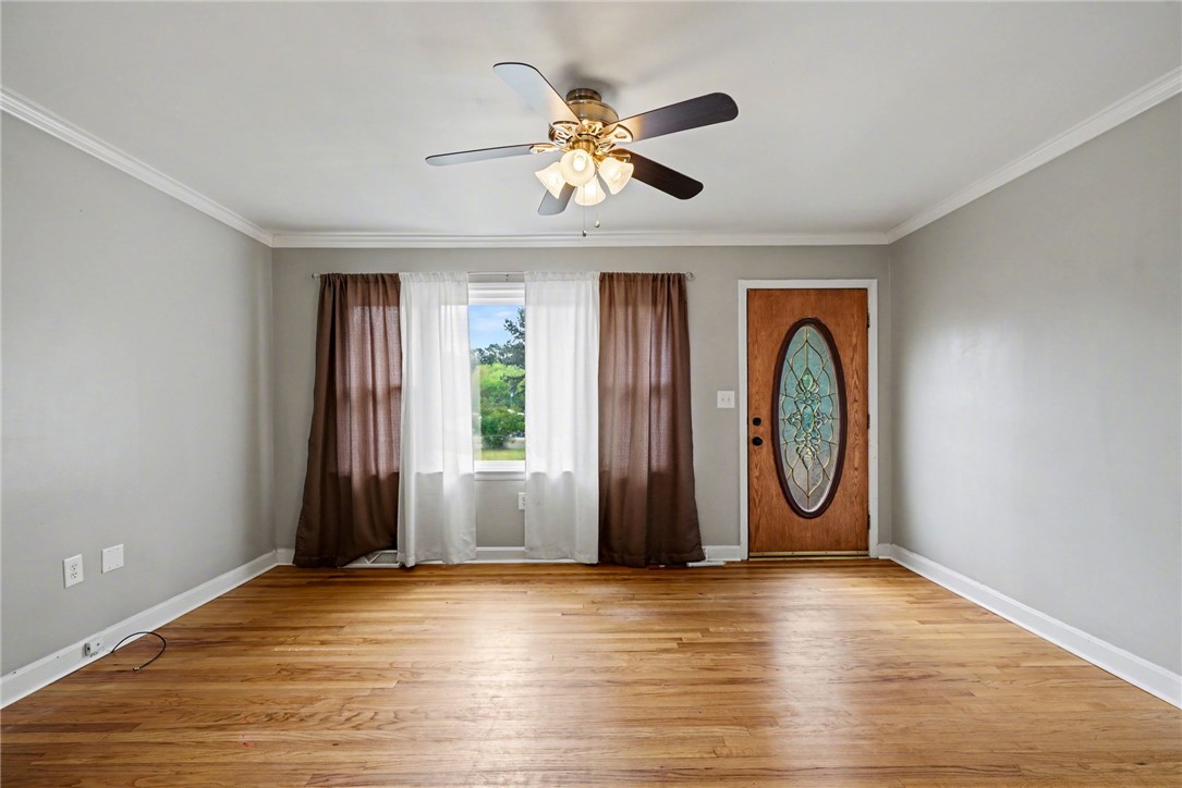 798 Coneross Creek Road Seneca, SC 29678 - Photo 7 of 34 This inviting space features classic hardwood floors and a striking front entry with decorative glass.