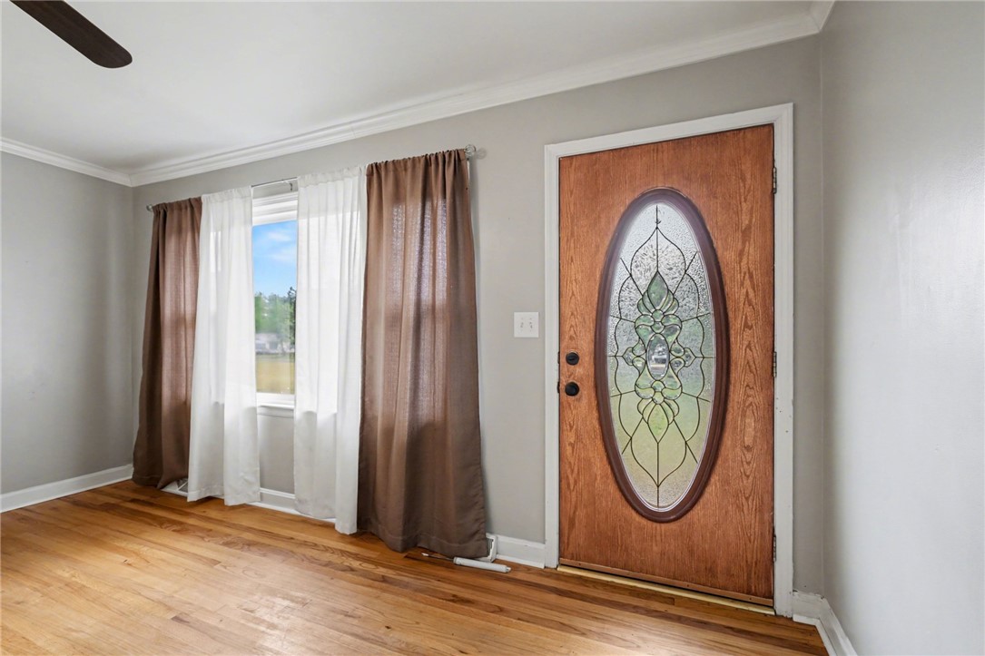 798 Coneross Creek Road Seneca, SC 29678 - Photo 8 of 34 This inviting entry features rich wood flooring and a beautiful decorative glass door.