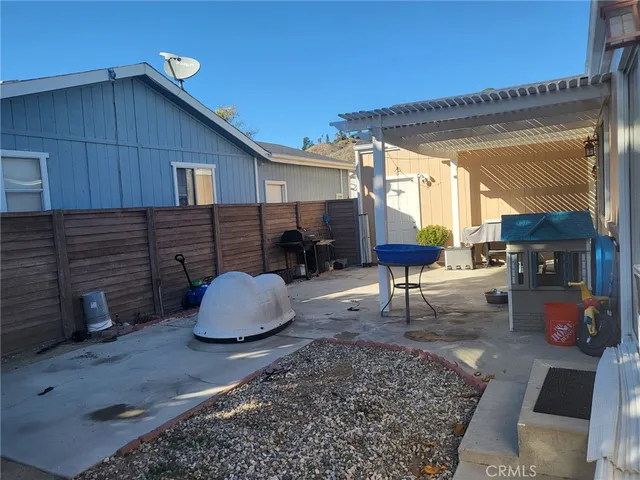 a front view of a house with patio