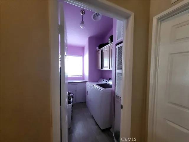 a room that has a bed and a mirror