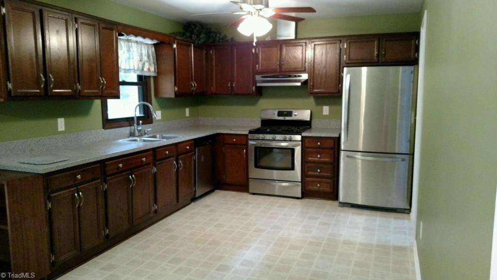 1001 Amity Road Asheboro, NC 27203 - Photo 7 of 10 Large open kitchen with lots of cabinet space and counter tops! Appliances included!