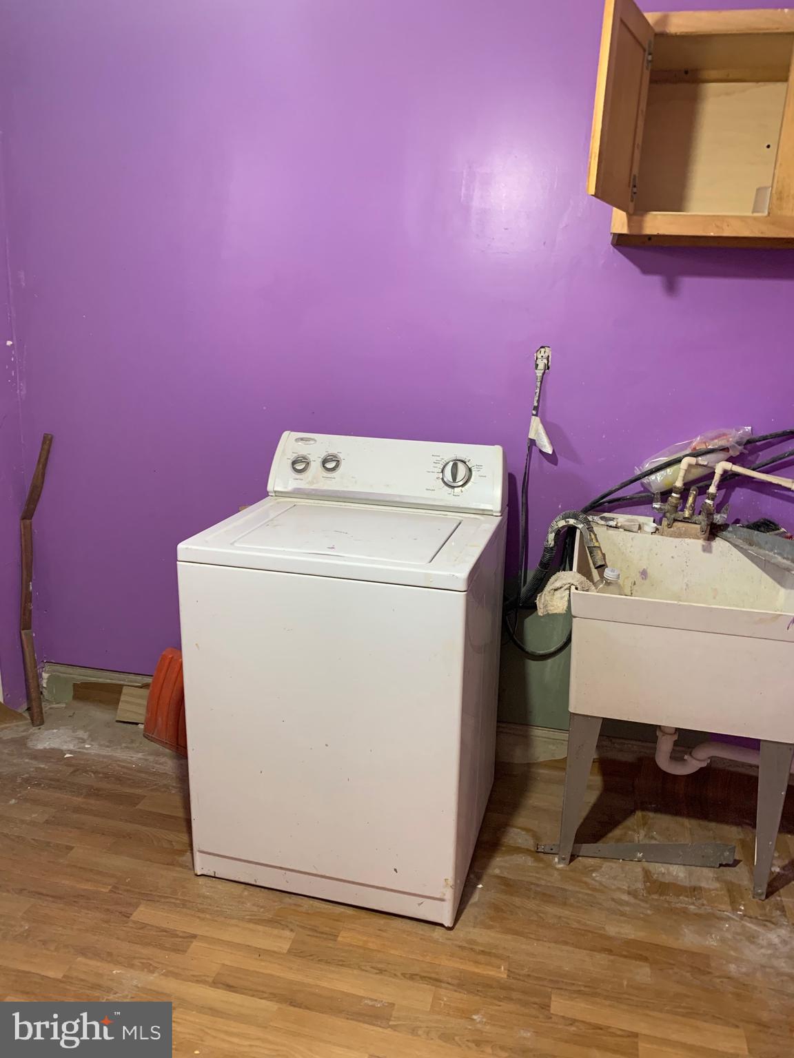 321 Highland Avenue Chester, PA 19013 - Photo 15 of 40 a utility room with dryer and washer