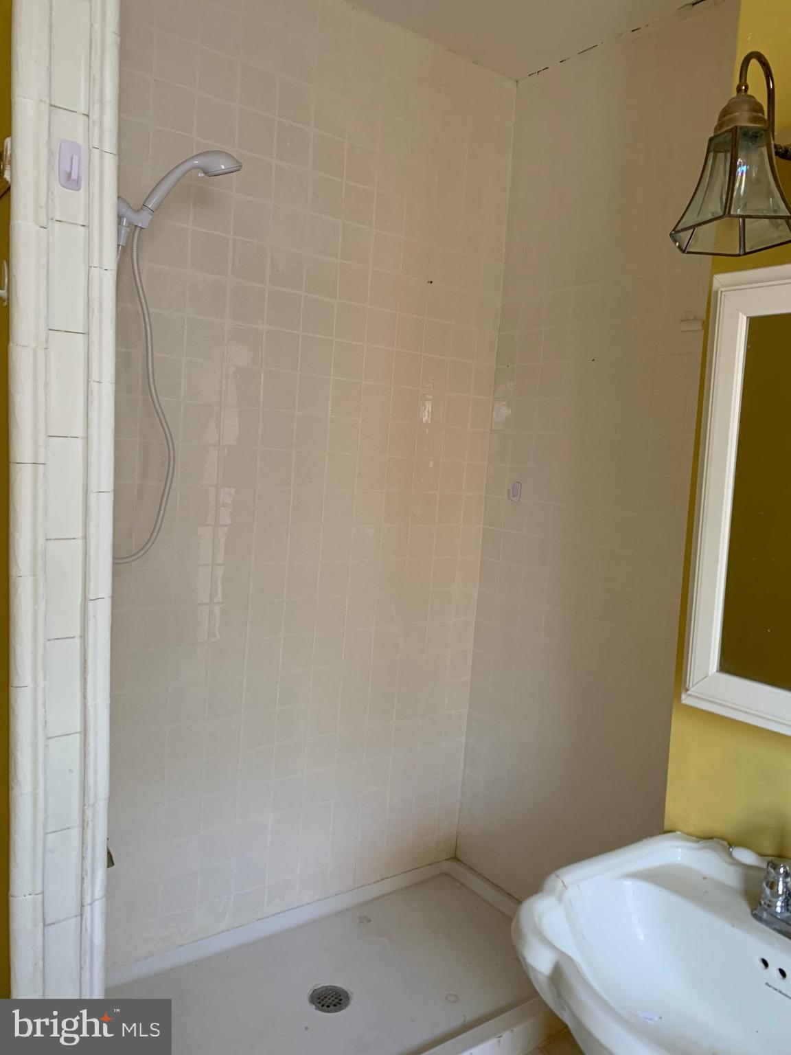 321 Highland Avenue Chester, PA 19013 - Photo 26 of 40 a bathroom with a sink and a toilet