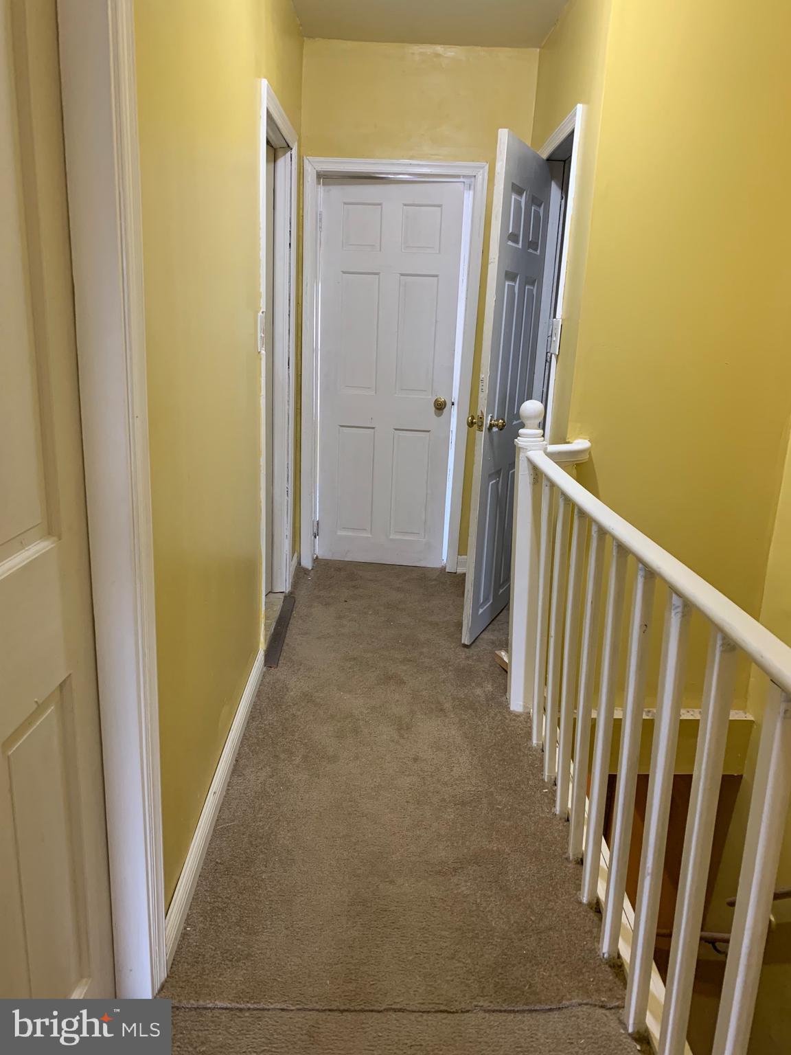 321 Highland Avenue Chester, PA 19013 - Photo 29 of 40 a view of a room with staircase