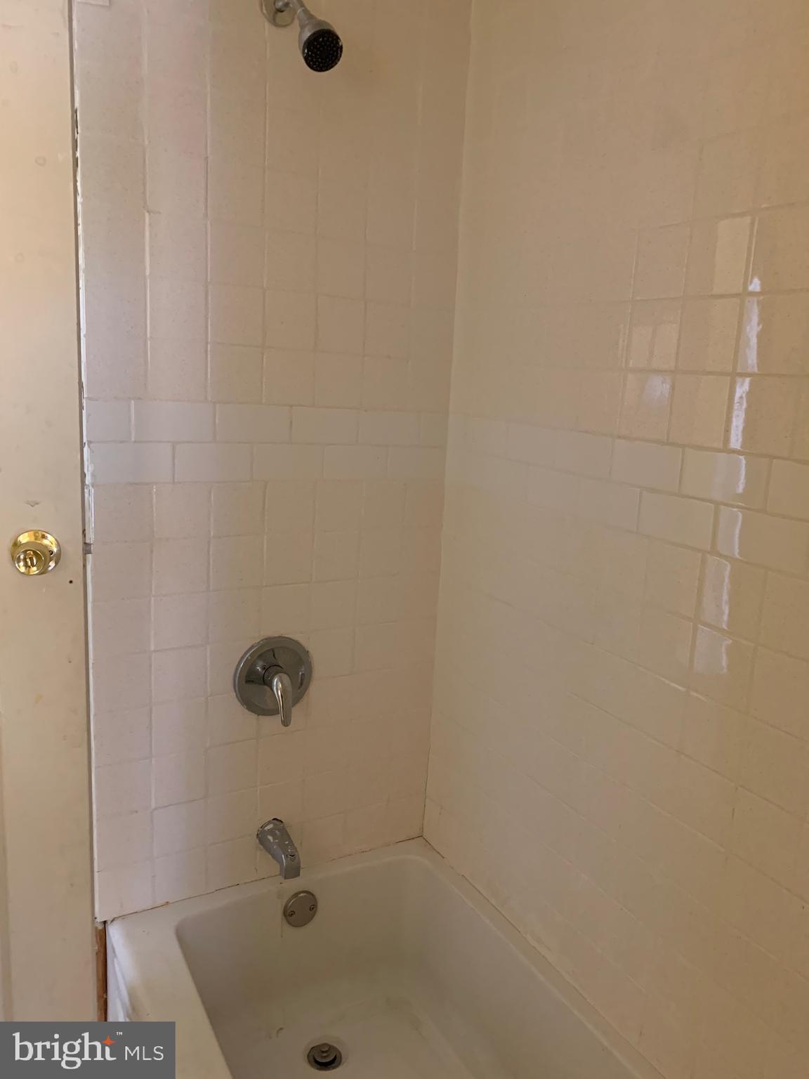 321 Highland Avenue Chester, PA 19013 - Photo 35 of 40 a bathroom with a shower