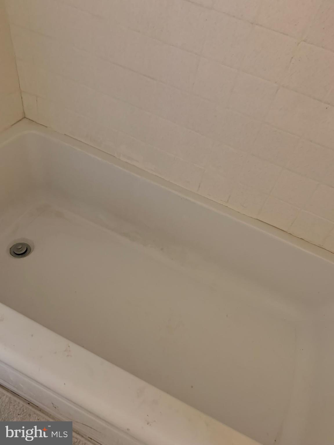 321 Highland Avenue Chester, PA 19013 - Photo 36 of 40 a bathroom with a bathtub