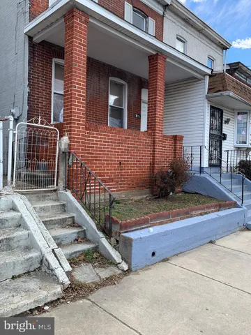 a view of house with wooden door