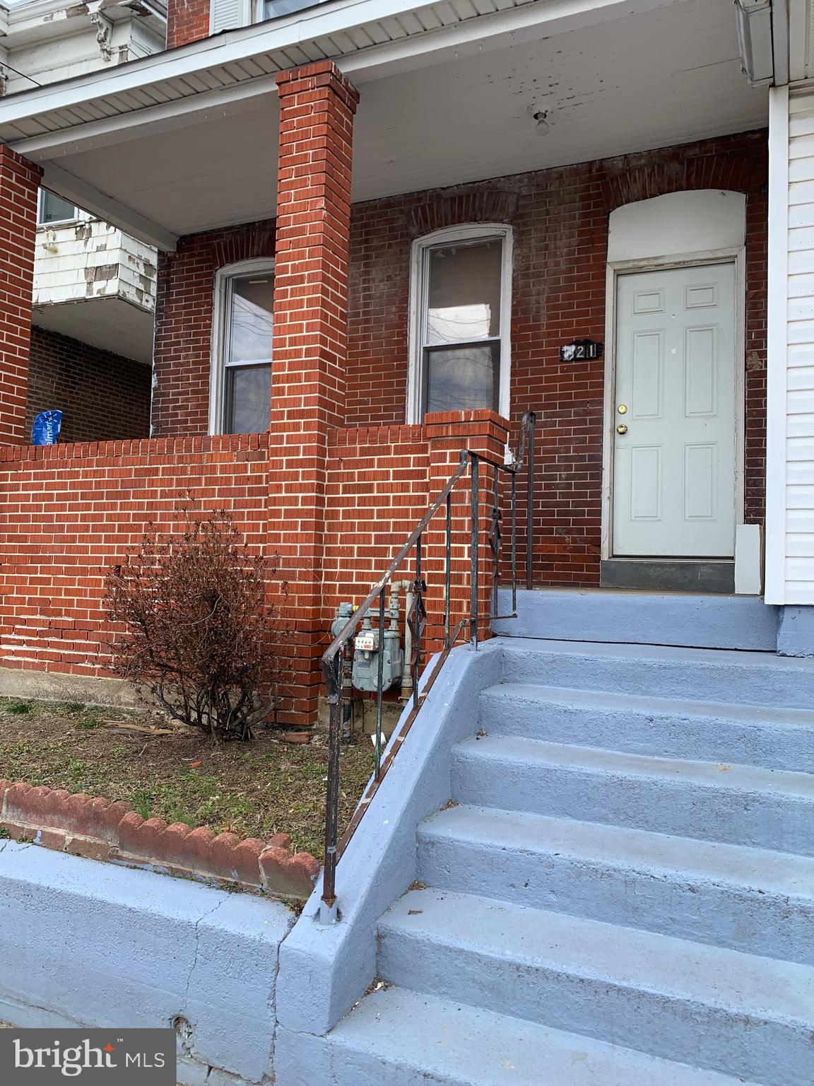 321 Highland Avenue Chester, PA 19013 - Photo 7 of 40 a view of house with wooden door