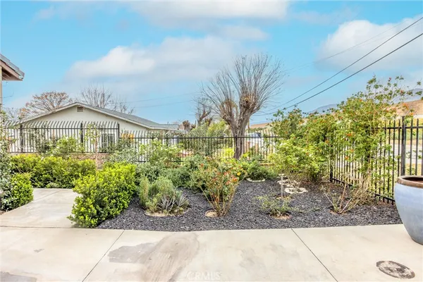 front view of house with a garden