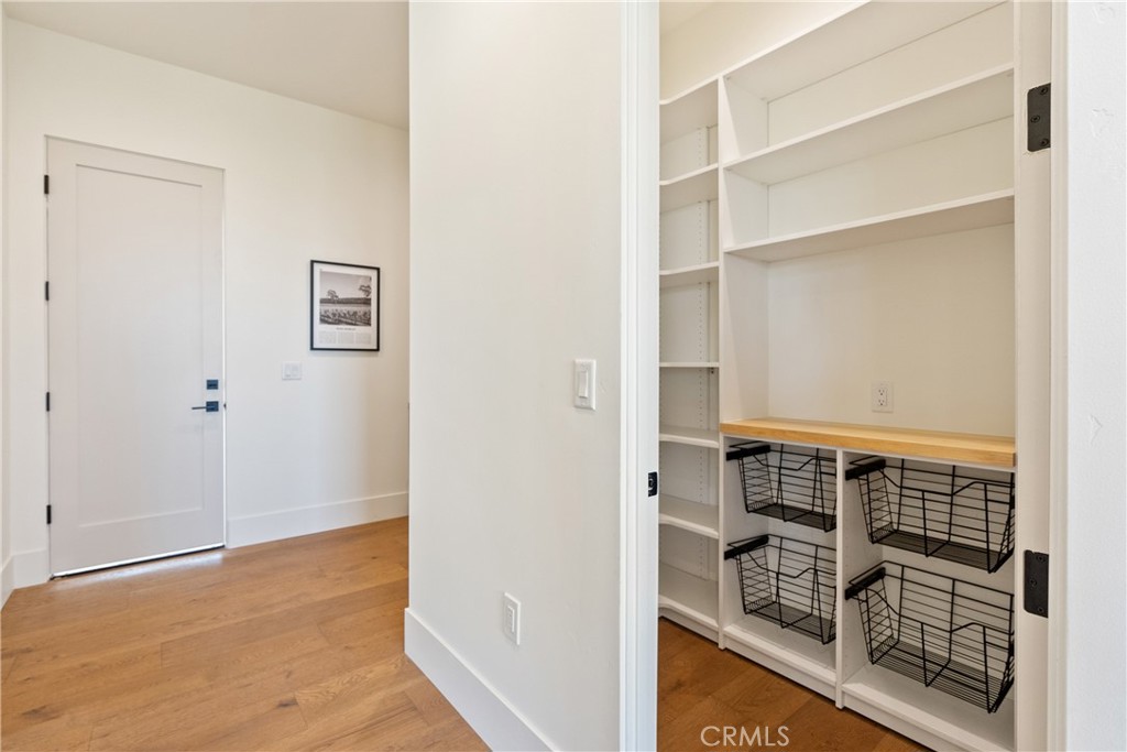 2220 Battering Rock Road Templeton, CA 93465 - Photo 19 of 59 a view of walk in closet with empty racks