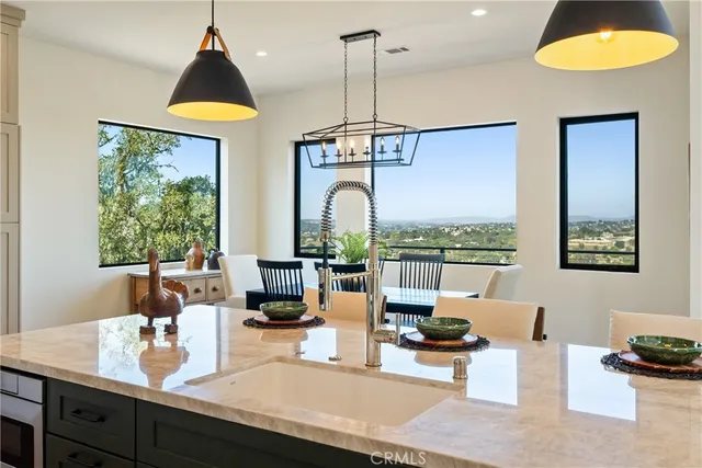 a view of an entryway with wooden floor and a bathroom