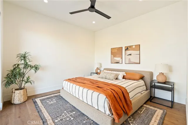 a bedroom with a bed and a walk in closet