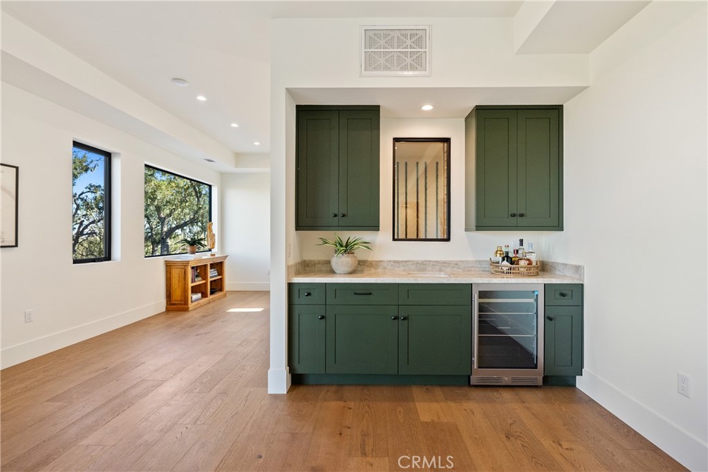 2220 Battering Rock Road Templeton, CA 93465 - Photo 32 of 57 a spacious bathroom with a double vanity sink and a large mirror