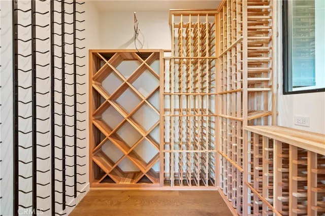 a bedroom with a bed and a walk in closet