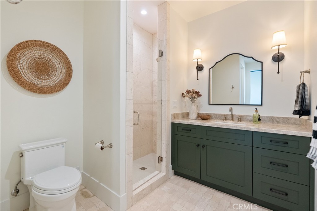 2220 Battering Rock Road Templeton, CA 93465 - Photo 37 of 59 a bathroom with a toilet a sink and mirror