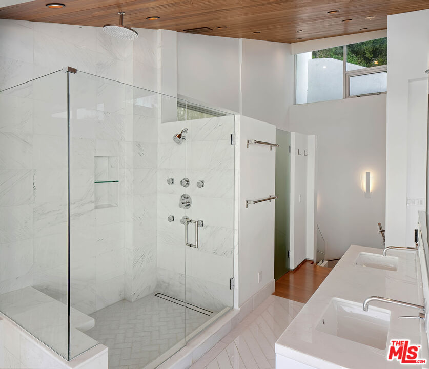 17405 Castellammare Drive Pacific Palisades, CA 90272 - Photo 11 of 29 a bathroom with a shower and a sink