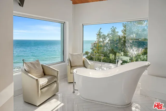 a view of a couch sitting in a backyard