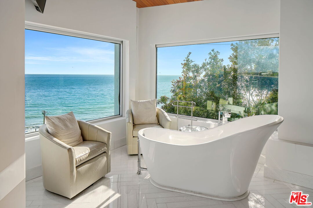 17405 Castellammare Drive Pacific Palisades, CA 90272 - Photo 12 of 29 a view of a couch sitting in a backyard