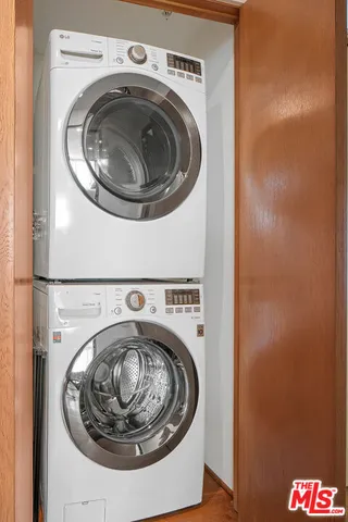 a view of a elevator with wooden floor