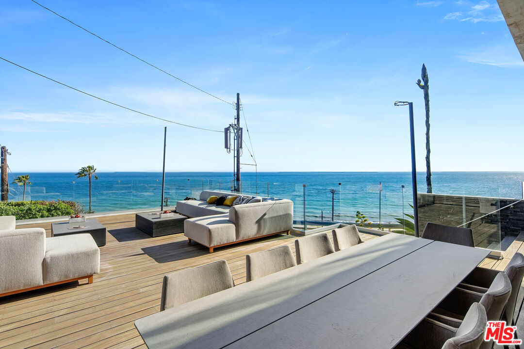17405 Castellammare Drive Pacific Palisades, CA 90272 - Photo 26 of 29 a view of a terrace with seating space
