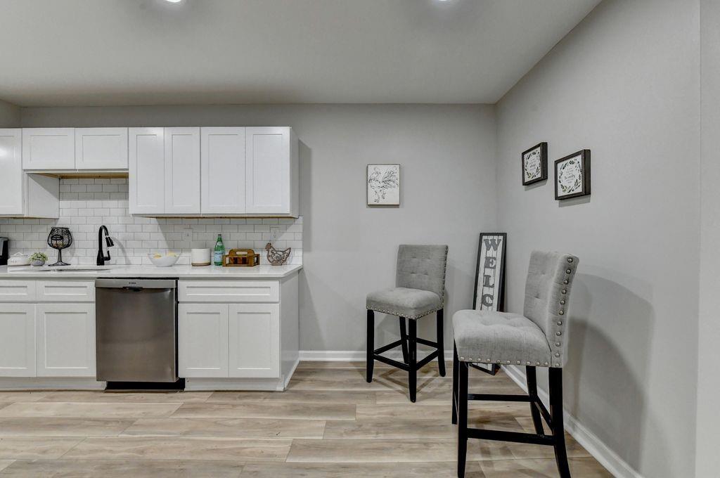 2503 Terrace Trail Decatur, GA 30035 - Photo 20 of 45 a kitchen with a cabinets and chairs in it