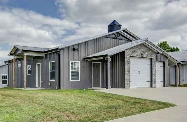 a house with yard in front of it