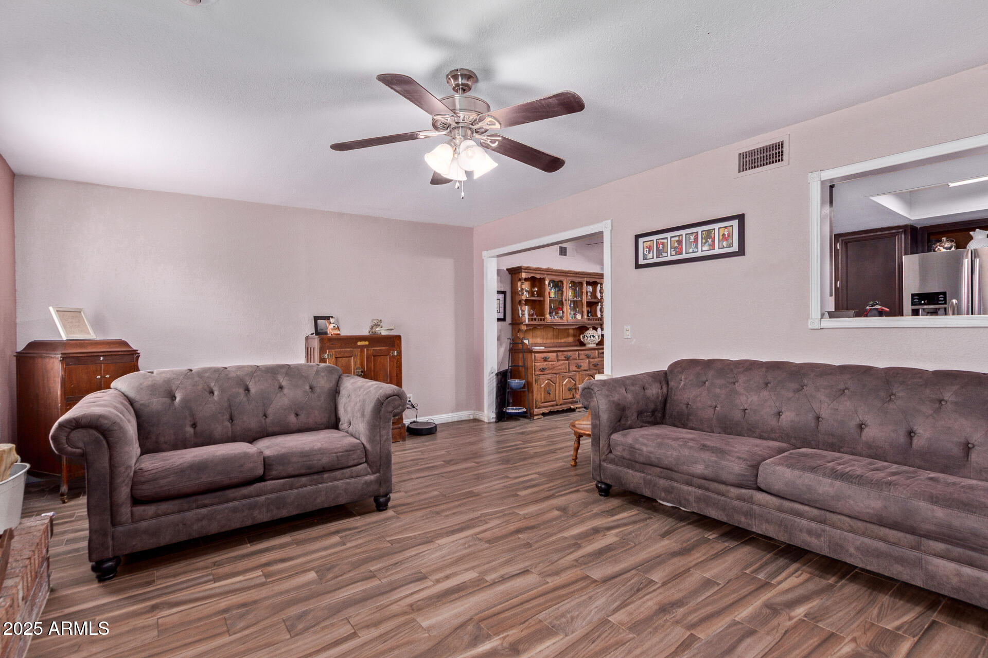 317 East Harwell Road Gilbert, AZ 85234 - Photo 12 of 29 a living room with furniture and a couch