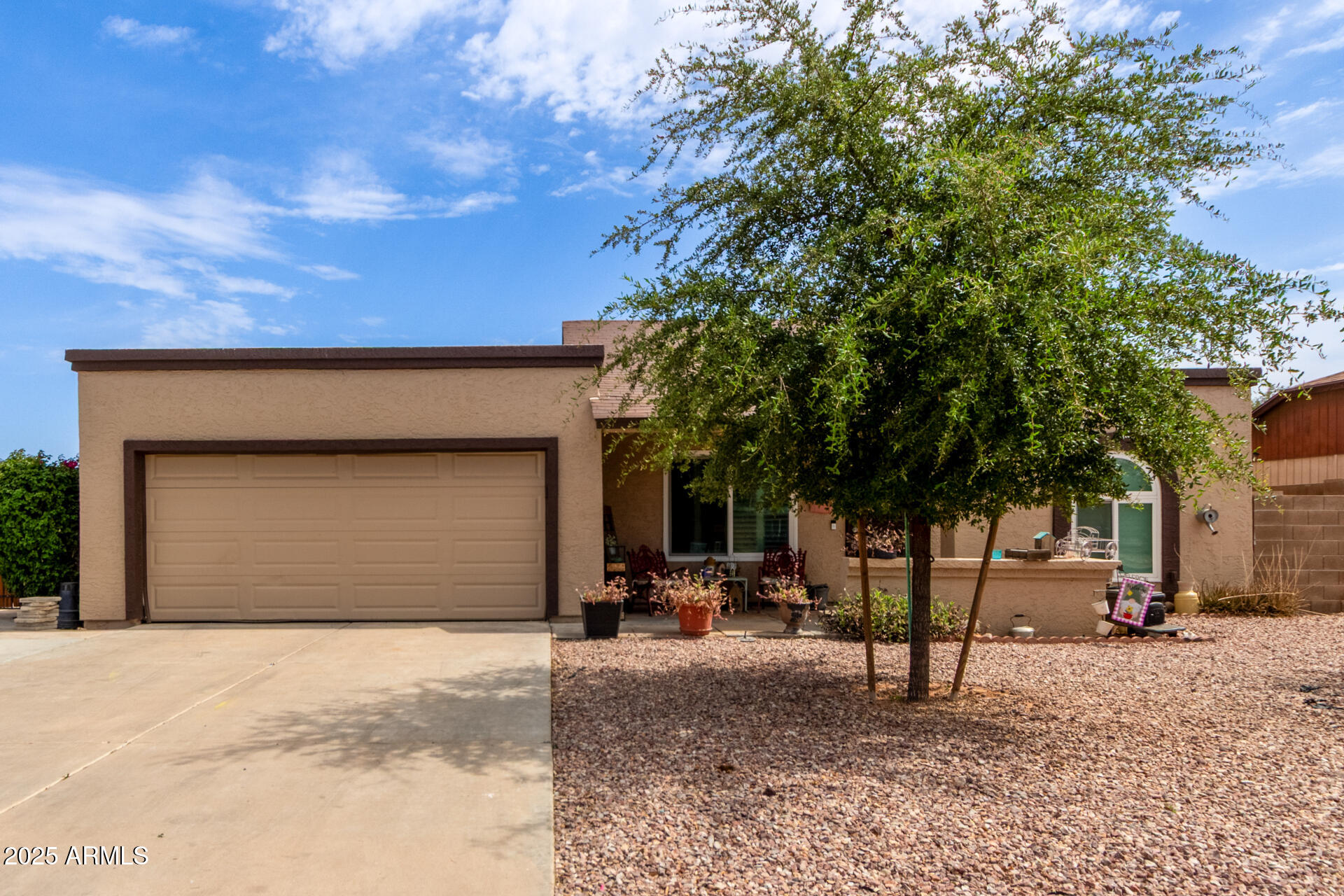317 East Harwell Road Gilbert, AZ 85234 - Photo 2 of 29 a front view of a house with a yard