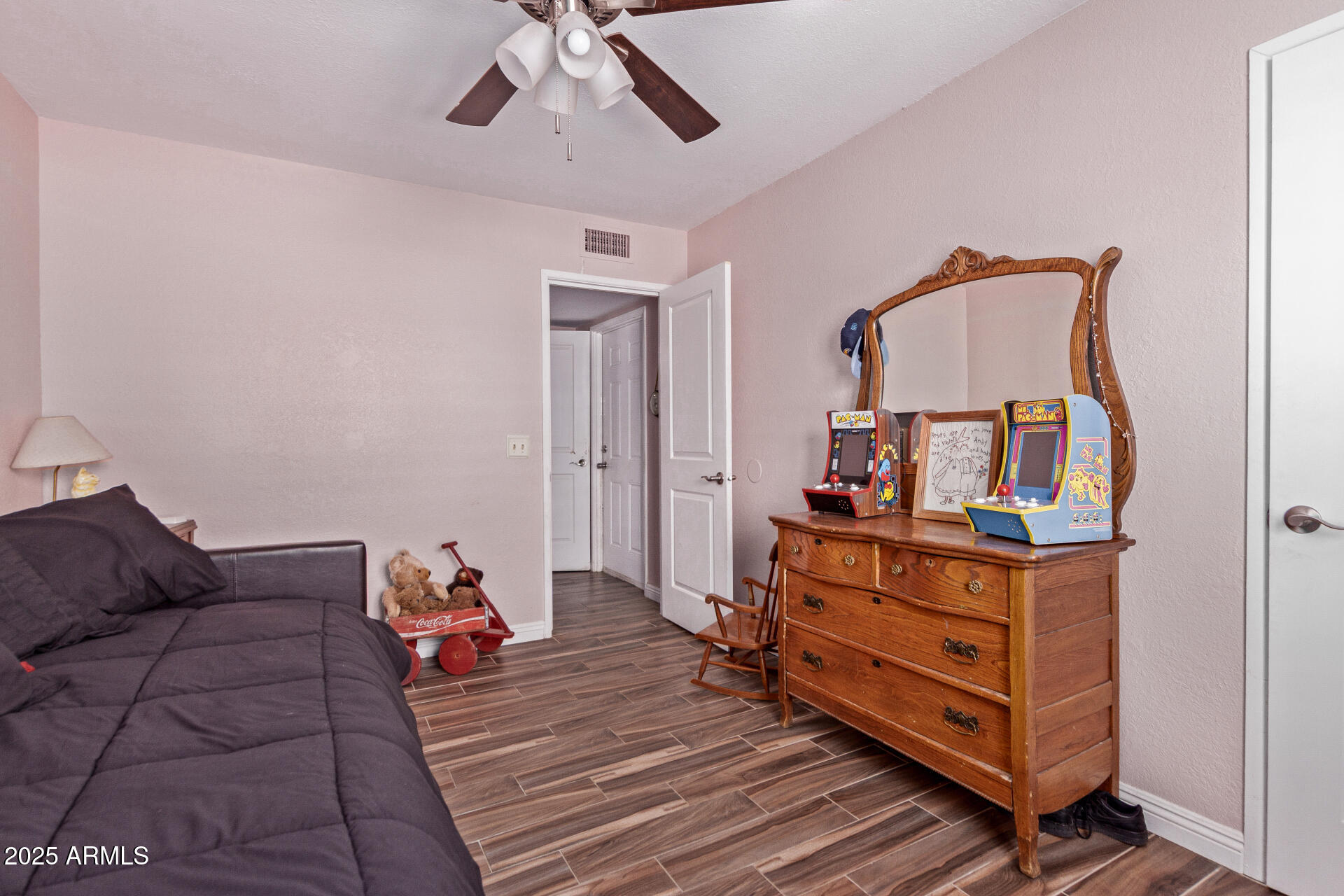 317 East Harwell Road Gilbert, AZ 85234 - Photo 21 of 29 a room with furniture and wooden floor