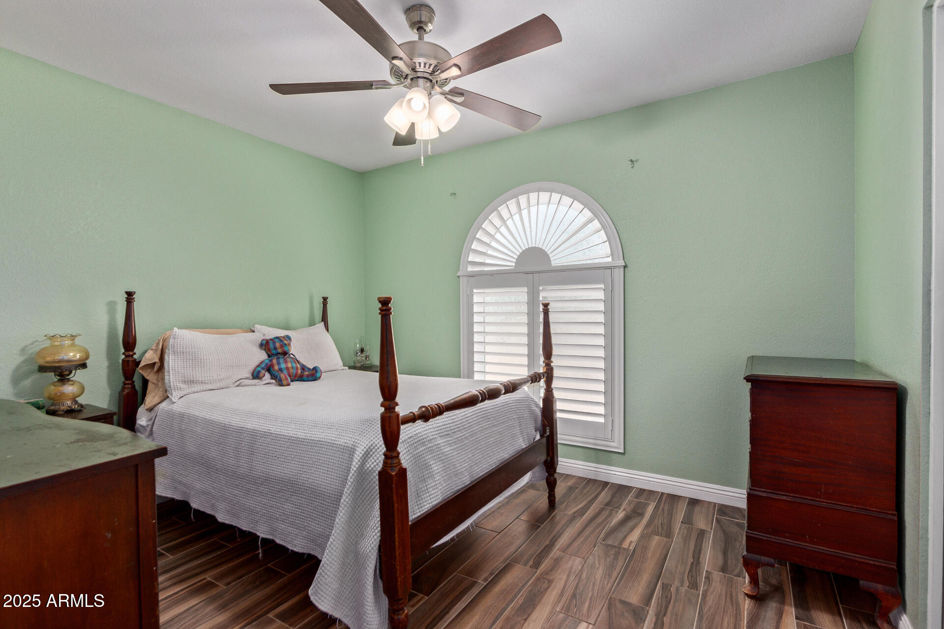 317 East Harwell Road Gilbert, AZ 85234 - Photo 23 of 29 a bedroom with a bed and a window